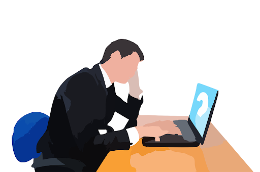 Employee sitting at desk with a computer